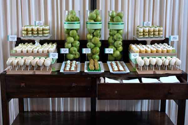 green and white dessert buffet table