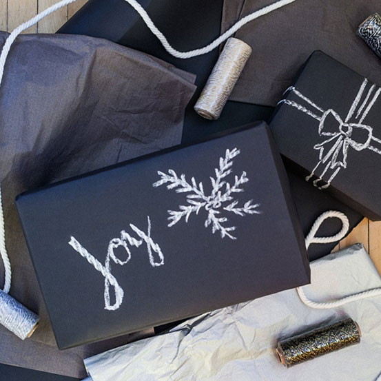 gifts wrapped with chalkboard wrapping paper