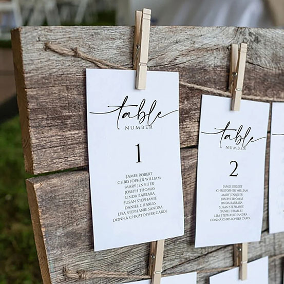 editable and printable wedding seating plan cards pegged to twine