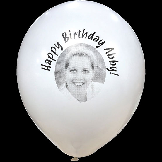 Picture of woman printed onto a white latex balloon with Happy Birthday Abby