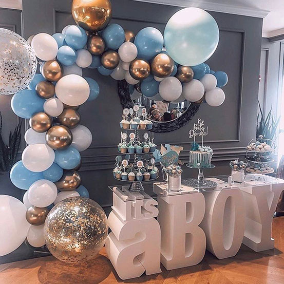 It's a Boy giant Styrofoam letters used as a base for a dessert table