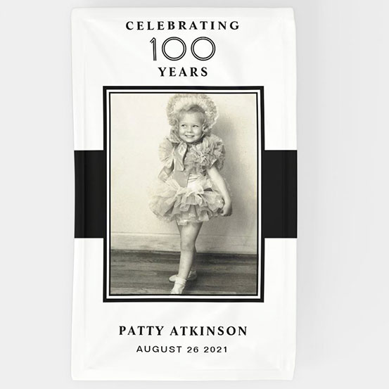 Celebrating 100 years custom photo banner showing birthday boy as a baby