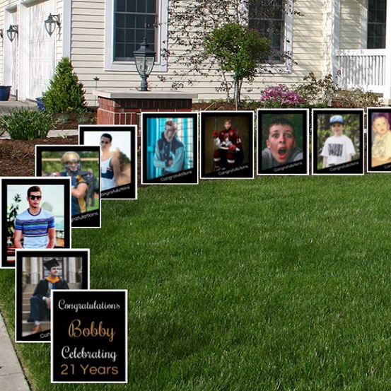 Through The Years photo lawn signs each sign showing birthday boy at a different age leading up to house