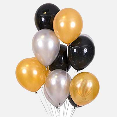 black, gold, white balloons