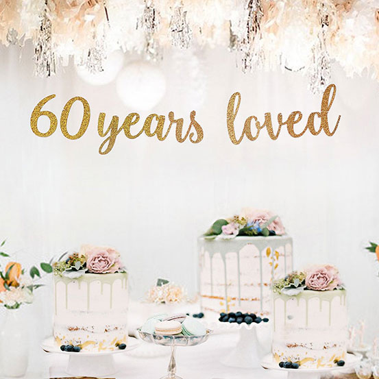 40 & Fabulous gold text banner with 2nd banner of gold lovehearts hung above