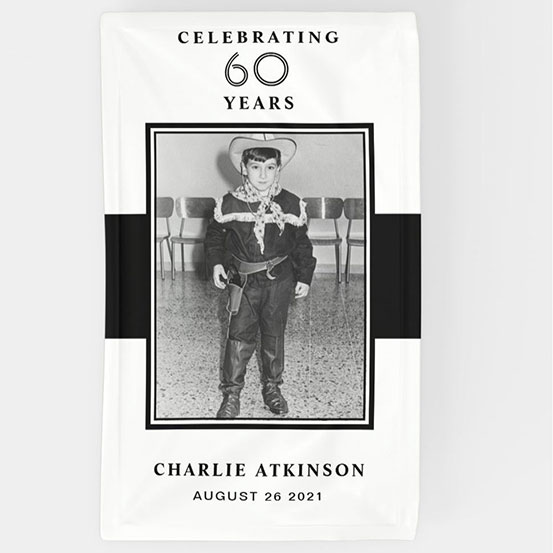 Celebrating 60 years custom photo banner showing birthday boy as a baby