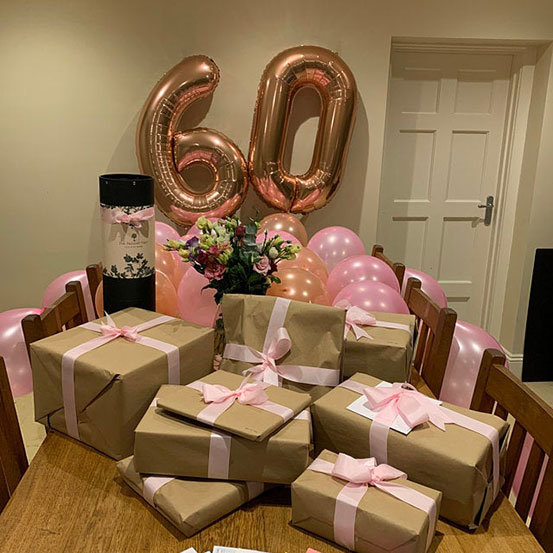 Giant number 60 balloons and other decorations