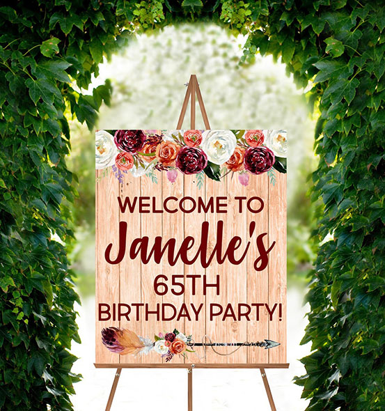 Forty & Fabulous 65th Birthday custom name welcome sign with floral design on an easel