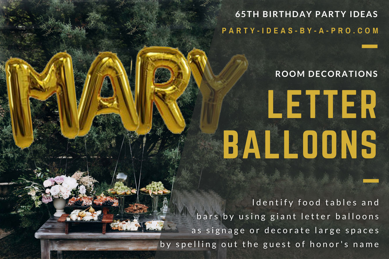 giant gold letter balloons spelling out the name Mary above party buffet table