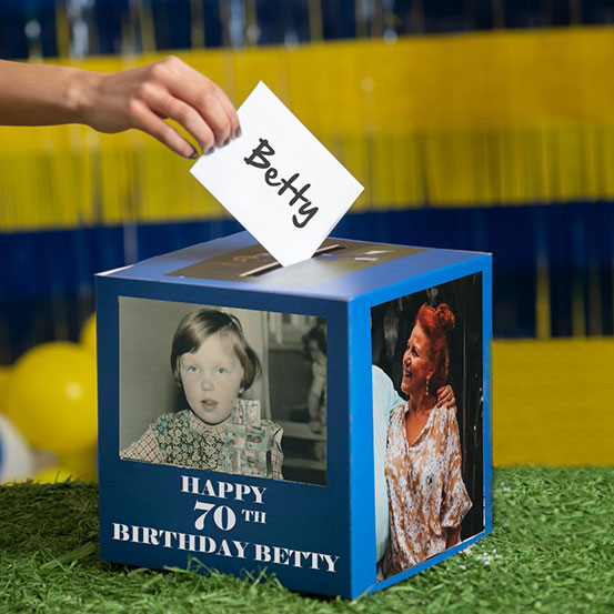 70th birthday card box printed with old photos of the birthday boy