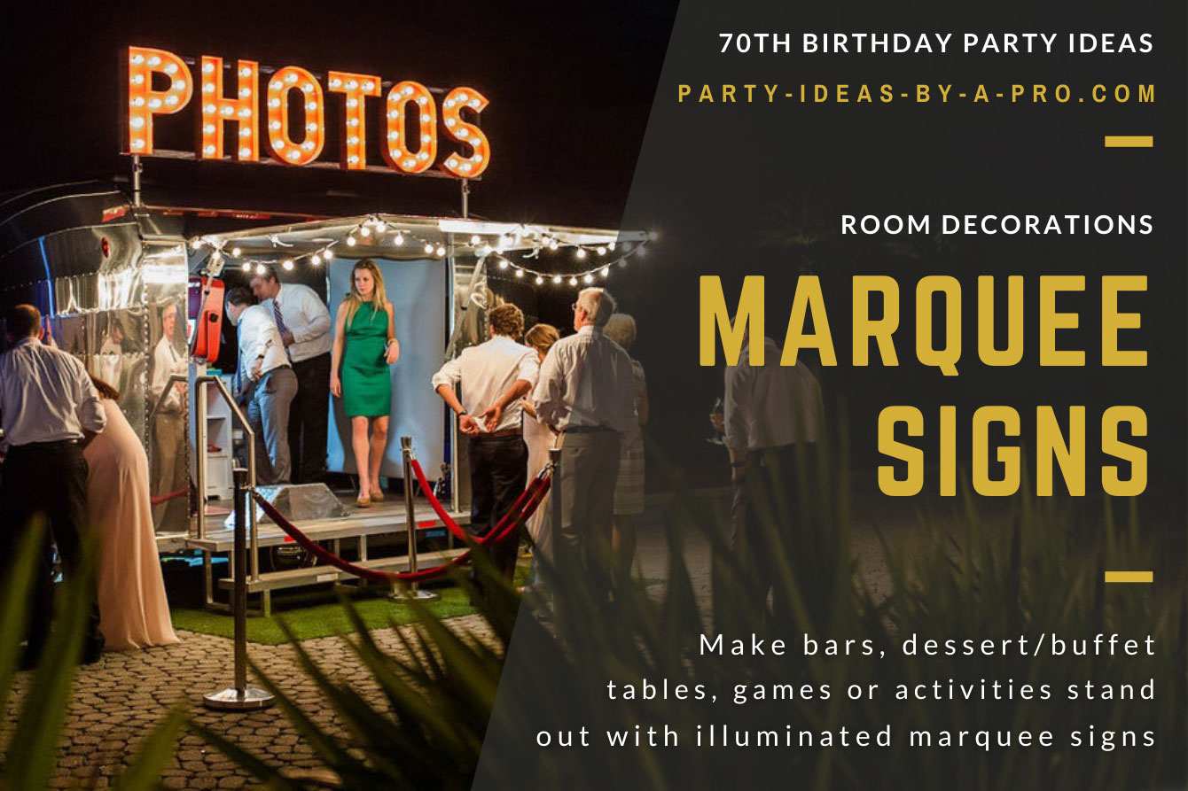 light up marquee sign spelling PHOTOS above event photo booth