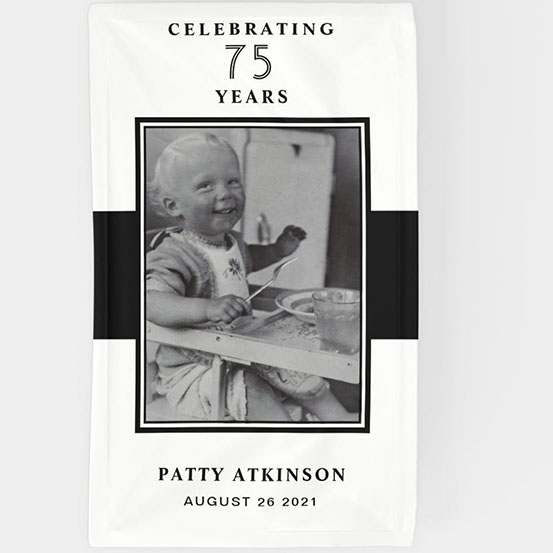 Celebrating 75 years custom photo banner showing birthday boy as a baby