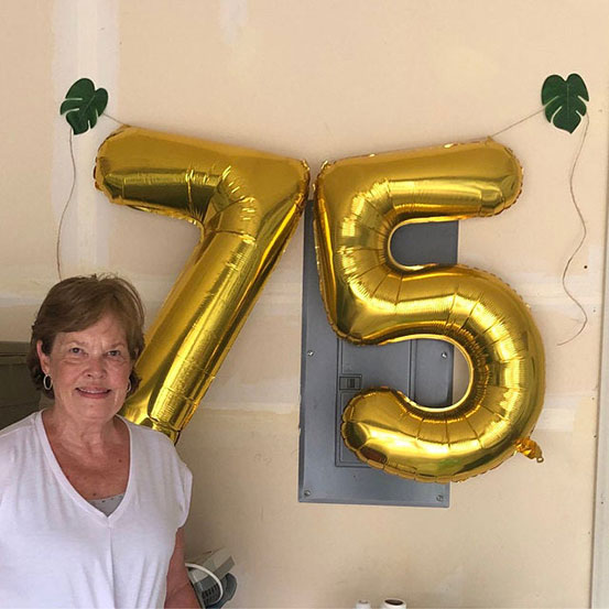 Giant number 75 balloons and other decorations