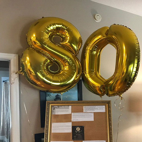 Giant number 80 balloons and other decorations