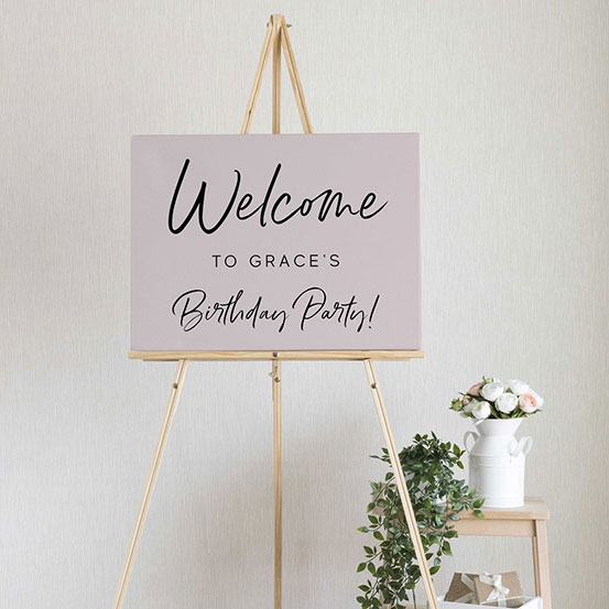 Black and gold sequin 90th Birthday custom name welcome sign on an easel