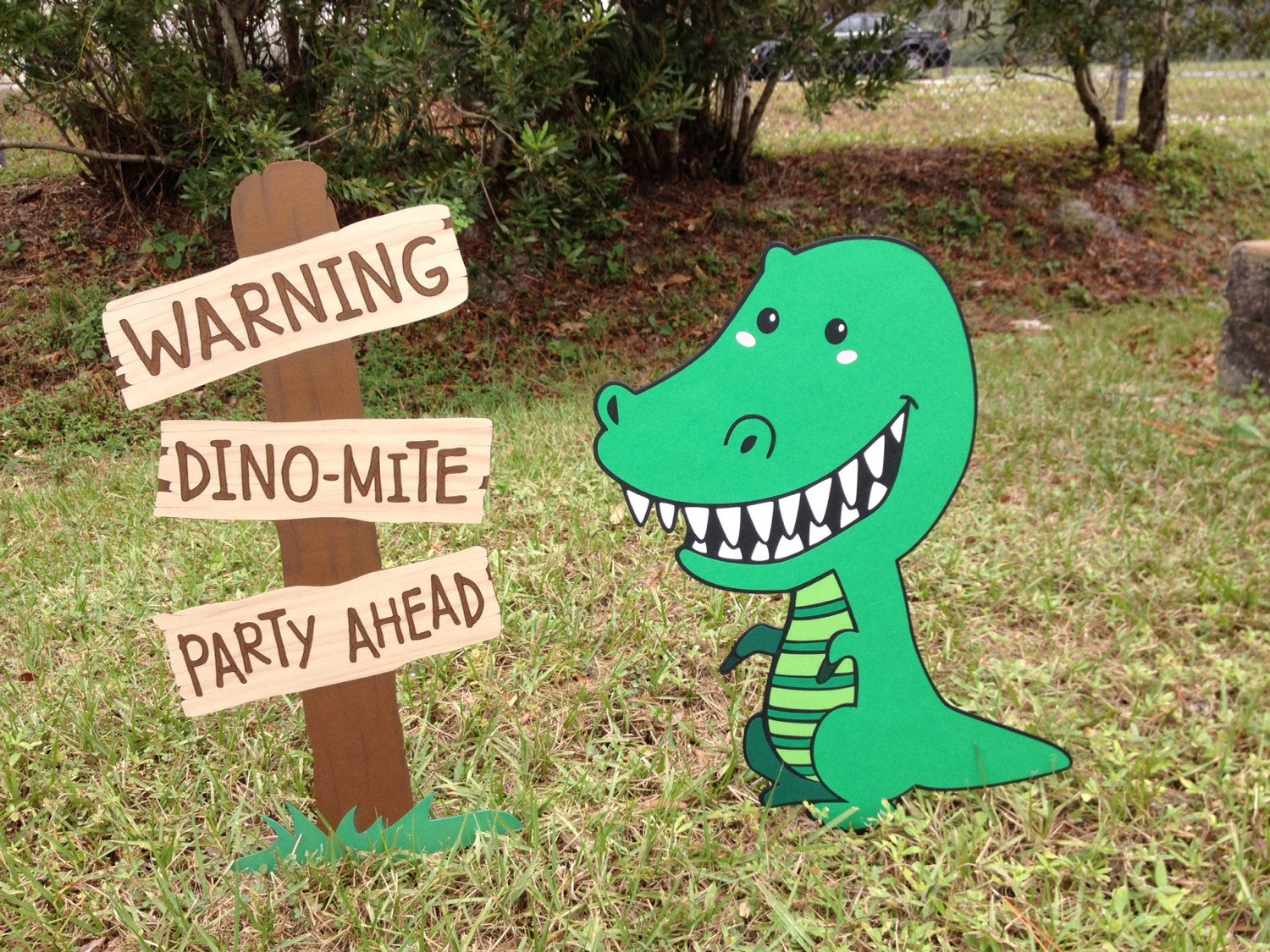dinosaur yard sign