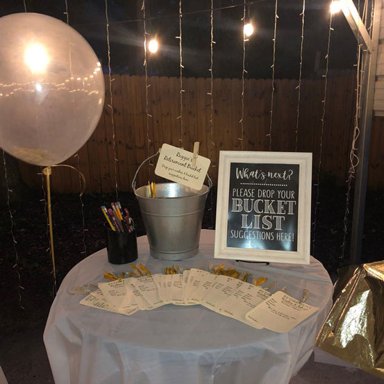 bucket list suggestions table set up at a party