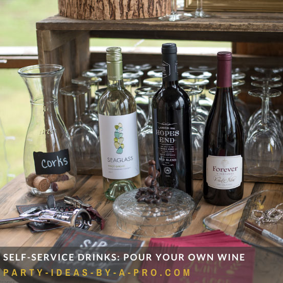 wine bottles and glasses on a self-service event bar