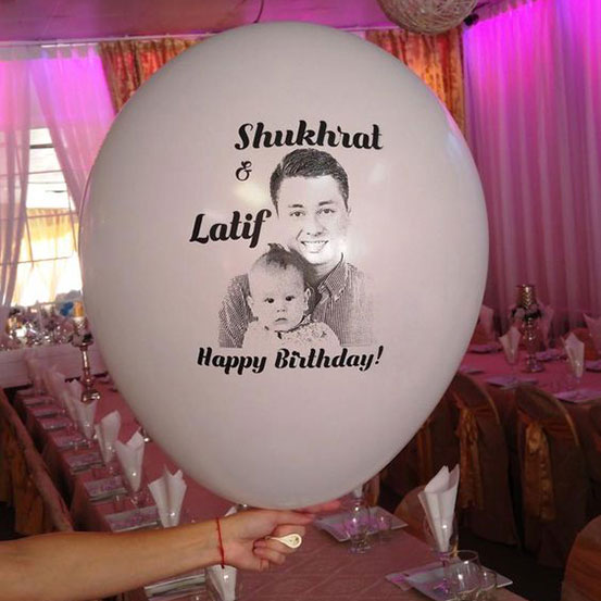 Picture of Father and son printed onto a white latex balloon with Happy Birthday