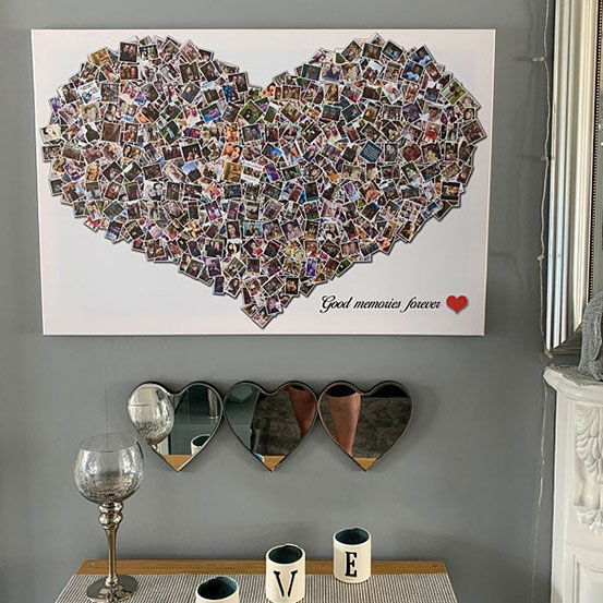 heart shaped photo collage hung on wall