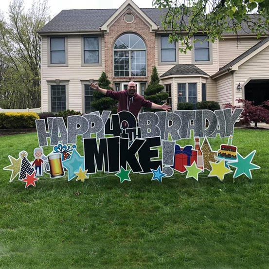 Happy 40th Birthday Mike yard card on front lawn of house
