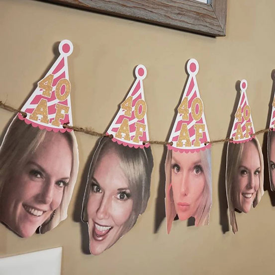 custom face banner of woman wearing 40 AF pink party hats