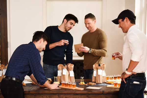men at beer tasting party