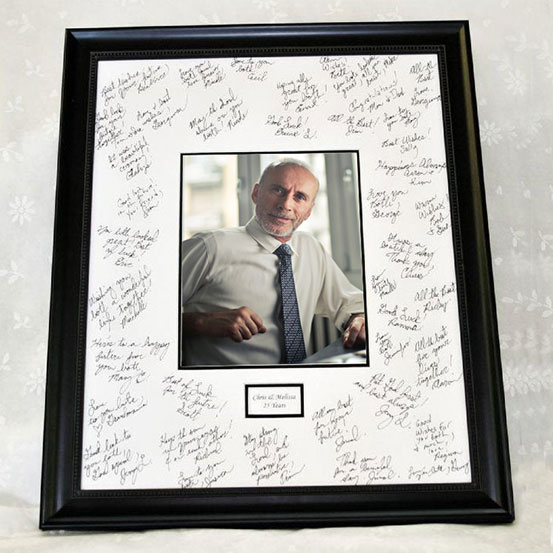 custom 65th birthday framed signing poster guestbook alternative with photo of birthday boy surrounded by handwritten messages