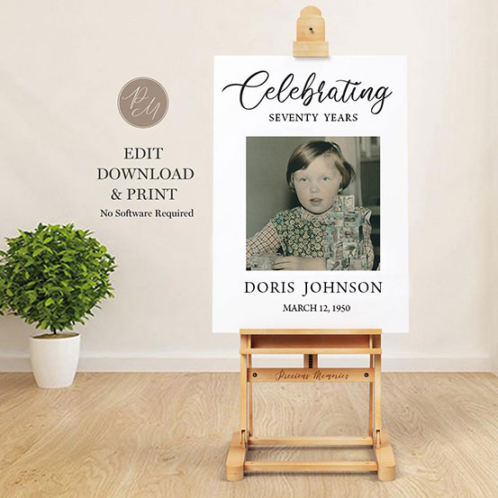 celebrating 70 years sign with photo of birthday boy as a baby displayed on an easel