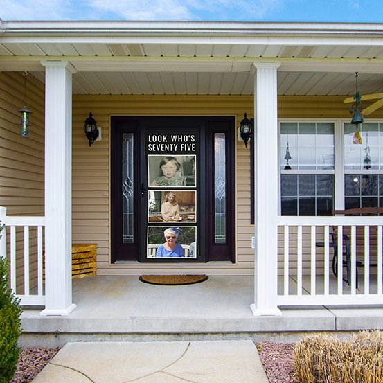 Look Who's Forty custom photo vertical banner hung on house front door