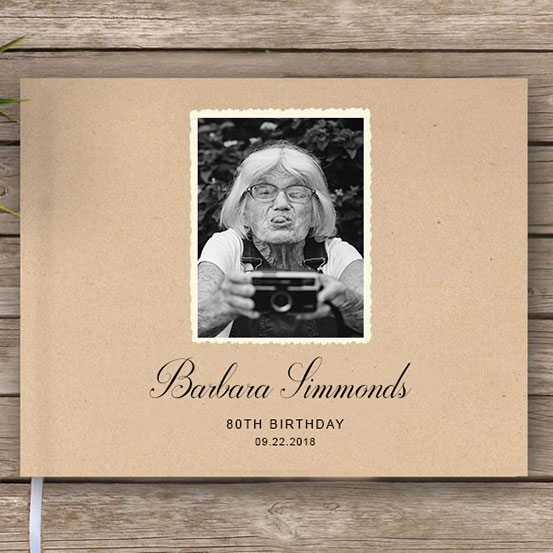 guestbook with cover photo of the birthday honoree