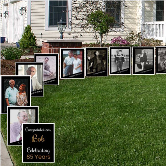 Through The Years photo lawn signs each sign showing birthday boy at a different age leading up to house