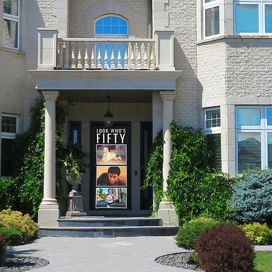 Look Who's Forty custom photo vertical banner hung on house front door