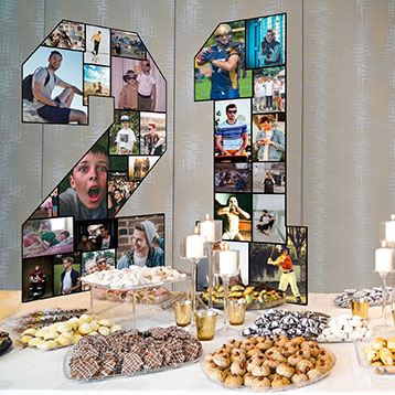 freestanding number 21 photo collage on dessert table