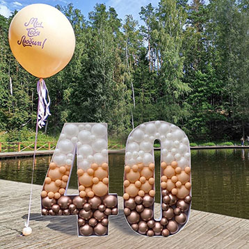 freestanding 40 balloon mosaic next to a lake