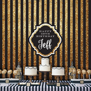 black and gold striped dessert table backdrop