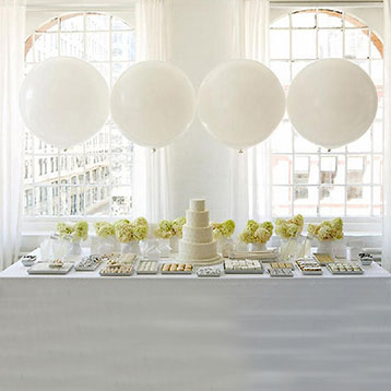 giant white balloons dessert table backdrop